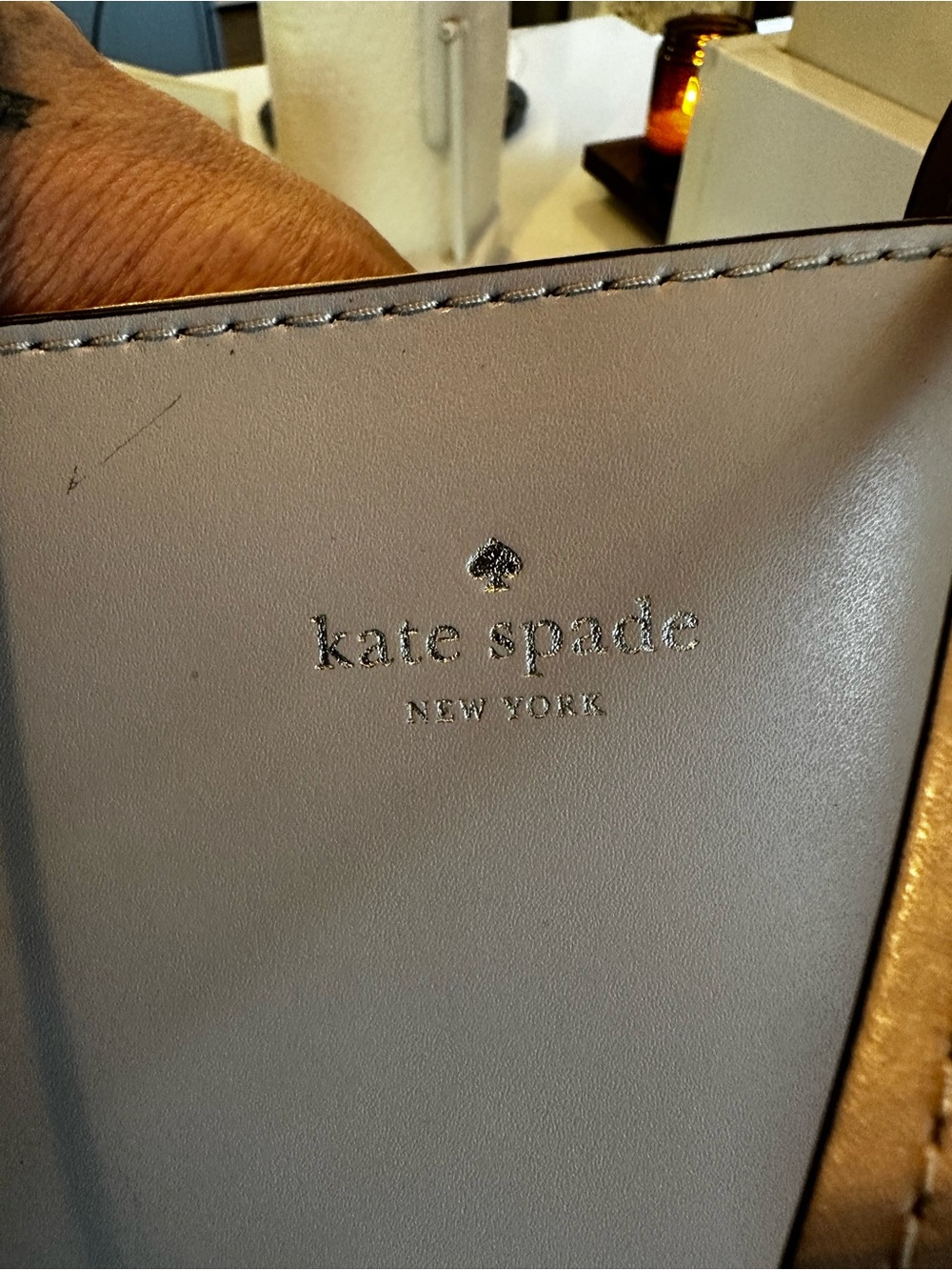 kate spade cream leather tote with metallic logo